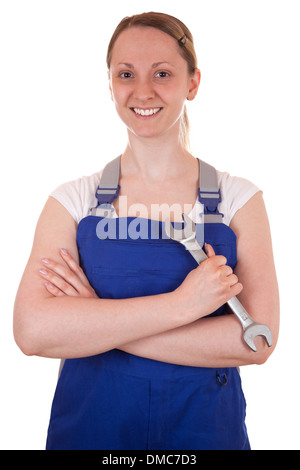 Young carpenter holding a wrench in her hand, isolated on white Stock Photo