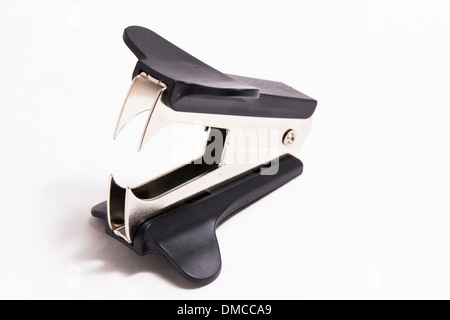 Staple remover on white Stock Photo