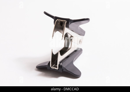 Staple remover on white Stock Photo