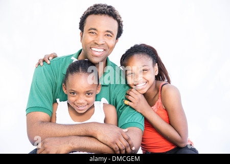 Father spending quality time with daughters on white background Stock Photo
