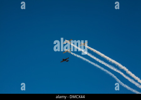 Four AT-6 Texans in formation At the Wings Over Camarillo Airshow in Camarillo California in August of 2011 Stock Photo
