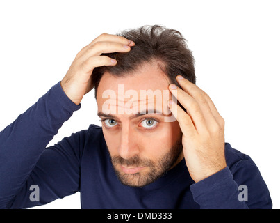 Caucasian young man controls hair loss Stock Photo