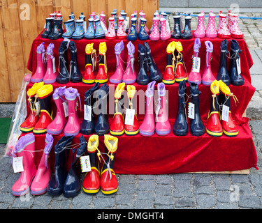 colourful wellington rubber boots in garden Stock Photo - Alamy