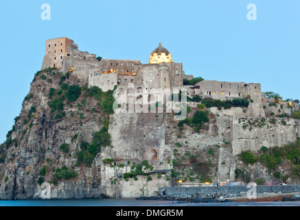 Aragonese Castle by night in Ischia island, Italy Stock Photo