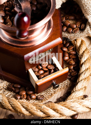 Coffee in grinder and rope still life Stock Photo