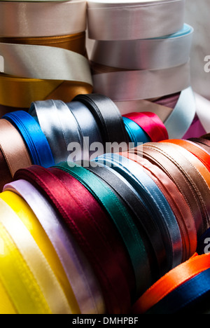 many-coloured ribbon spools in the craft Stock Photo