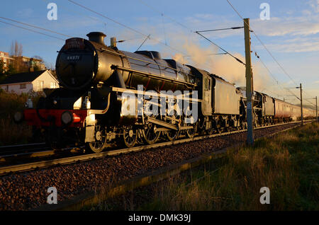 Black 5 steam locomotives number 45407 and 44871 The Lancashire Fusilier pulled a special Christmas Carol steam railway train from Southend Central bound for Chichester 'double headed' at dawn Stock Photo