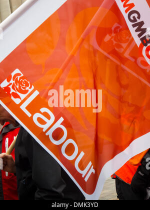 Portsmouth, UK. 14th December 2013. A labour party flag is carried as hundreds of BAE workers protest against the possible closure of the BAE shipbuilding facility. Credit:  simon evans/Alamy Live News Stock Photo