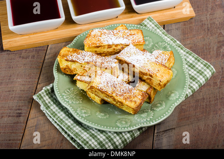 French toast sticks with syrups for dipping Stock Photo