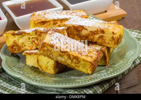 French toast sticks with syrups for dipping Stock Photo
