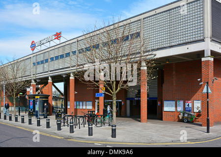 Exterior facade and street scene at West Ham underground and Network Rail interchange passenger train station East London England UK Stock Photo