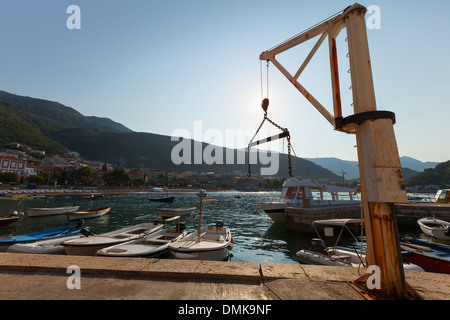 Small marine crane in port of Petrovac town, Montenegro Stock Photo