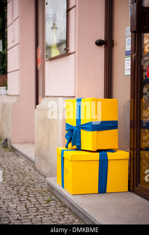 dummy big yellow gifts with blue ribbon Stock Photo