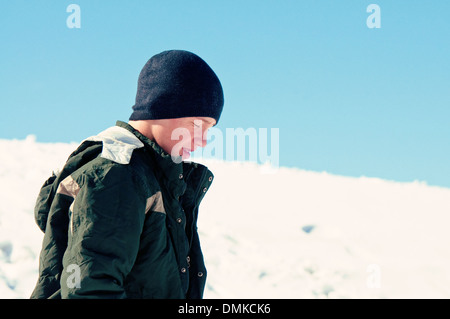 Teen boy walking in white casual outfit on isolated background Stock ...