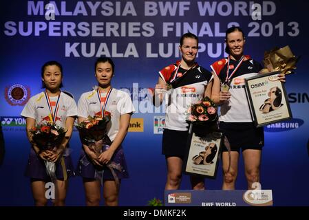 Kuala Lumpur, Malaysia. 15th Dec, 2013. Gold medalists Rytter Juhl (1st R), Christinna Pedersen (2nd R) of Denmark, silver medalists Tang Jinhua (2nd L) and Ma Jin of China pose on the podium after the women's doubles final at the BWF World Superseries Finals in Kuala Lumpur, Malaysia, Dec, 14, 2013. Credit:  Chong Voon Chung/Xinhua/Alamy Live News Stock Photo