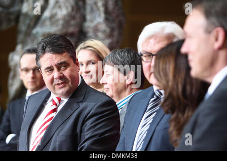Berlin, Germany. 15th Dec, 2013. New Economy and Energy minister, SPD leader Sigmar Gabriel (front, L) speaks with other SPD politicians during a press conference in Berlin, Germany, Dec. 15, 2013. Germany's Social Democratic Party (SPD) formally announced its cabinet members on Sunday, one day after party members voted to enter a grand coalition with Chancellor Angela Merkel's conservatives. Credit:  Zhang Fan/Xinhua/Alamy Live News Stock Photo