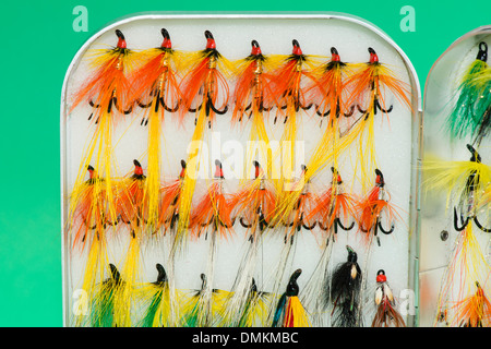 Box of artificial flies for salmon fishing with double handed fly rod and  large arbour reel Stock Photo - Alamy