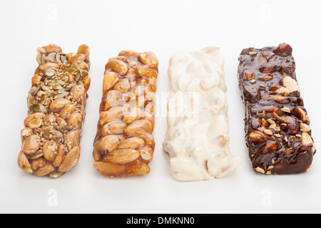 almond nougat and honey and chocolate turron bars isolated on white Stock Photo