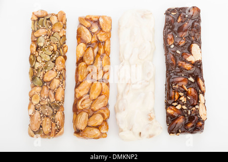 almond nougat and honey and chocolate turron bars isolated on white Stock Photo