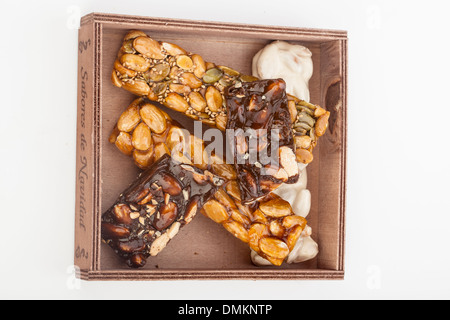 almond nougat and honey and chocolate turron bars isolated on white Stock Photo
