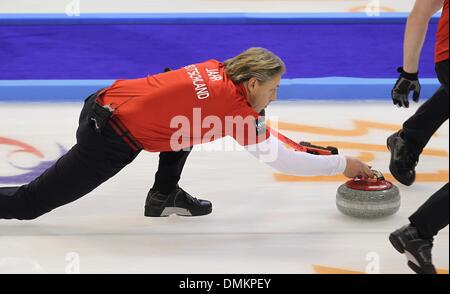 Fuessen, Germany. 14th Dec, 2013. The German curler John Jahr plays during the game for the qualification for the olympics at the Arena in Fuessen, Germany, 14 December 2013. Photo: Karl-Josef Hildenbrand/dpa/Alamy Live News Stock Photo