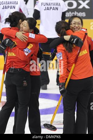 Fuessen, Germany. 14th Dec, 2013. The Chinese curler Qingshuang Yue (L-R), Yin Liu, Binguyu Wang and Yan Zhou cheer during the game for the qualification for the olympics at the Arena in Fuessen, Germany, 14 December 2013. Photo: Karl-Josef Hildenbrand/dpa/Alamy Live News Stock Photo