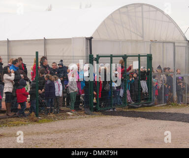Leyland, Preston, Lancashire, UK. 15th Dec 2013. Crowds of children and parents awaiting the arrival of Santa by helicopter today Credit:  Sue Burton/Alamy Live News Stock Photo