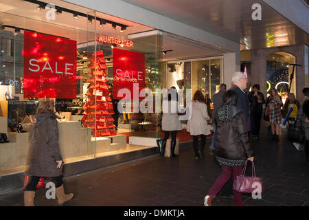 Liverpool One, Merseyside, UK 15th Dec, 2013. Kurtgeiger where Big discounts being offered by retailers tempted Christmas shoppers out in huge numbers in high streets and shopping centres across the UK today.  It meant retailers were enjoying brisk trading on the penultimate Sunday before Christmas Day.  Some of the most famous stores offered general reductions of up to 50% and cut prices by up to 75% on selected gifts.  Thousands of shoppers descended on the city centre, which has already smashed its own records in the run up to Christmas. Credit:  Cernan Elias/Alamy Live News Stock Photo