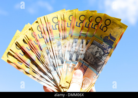 Person holding Australian dollars Stock Photo