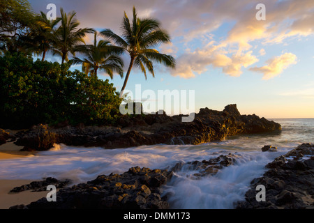 Sunset at Secret Beach, Maui, Hawaii. Stock Photo