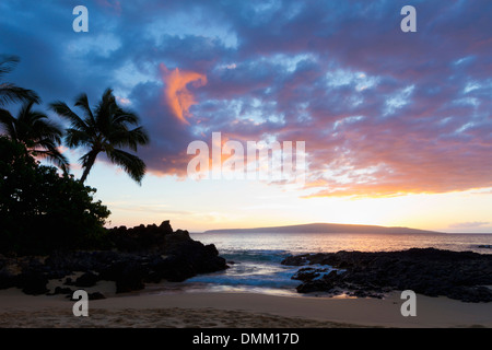 Sunset at Secret Beach, Maui, Hawaii. Stock Photo