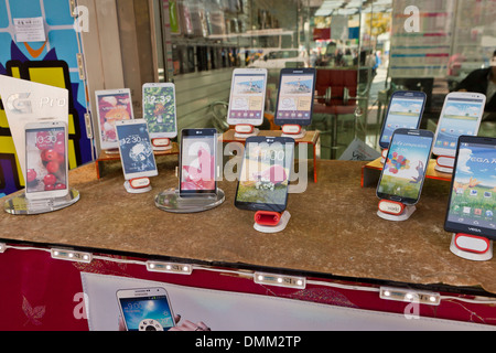 Mobile phone store window display - Busan, South Korea Stock Photo - Alamy