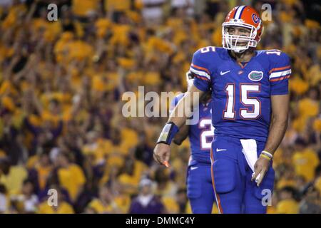 Florida quarterback Tim Tebow (15) scrambles on the run from the LSU  defence during the first half action in the game between #1 ranked Florida  Gators and the #4 ranked LSU Tigers