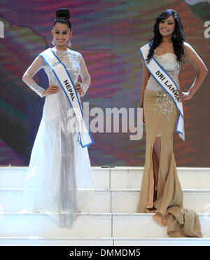 Magdeburg, Germany. 14th Dec, 2013. Osika Neupane (L) of Nepal and Ayomi Manoja Hirumali Vithanage of Sri Lanka on stage during the Miss Intercontinenal 2013 beauty pageant in Magdeburg, Germany, 14 December 2013. Participants from 59 countries contested for the title Miss Intercontinental 2013. Photo: JENS WOLF/dpa/Alamy Live News Stock Photo