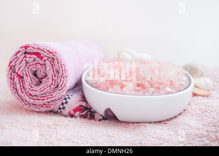 pink 'bath salt'  towel spa therapy aromatherapy 'bath salt crystals' Stock Photo