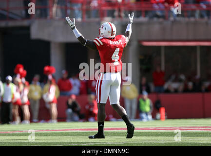 Oct. 17, 2009 - Lincoln, Nebraska, U.S - 17 October 2009: Nebraska safety Larry Asante urges the crowd to get loud during Saturday's game against Texas Tech. Texas Tech defeated Nebraska 31-10 in front of 86,107 fans, an NCAA-record 301st consecutive sellout at Memorial Stadium in Lincoln, NE. (Credit Image: © Michelle Bishop/Southcreek Global/ZUMApress.com) Stock Photo