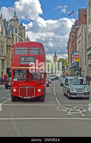 Routemaster bus on Whitehall with Big Ben in the background. Stock Photo