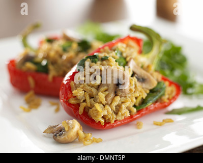 stuffed red peppers rice mushroom spinach salad Stock Photo