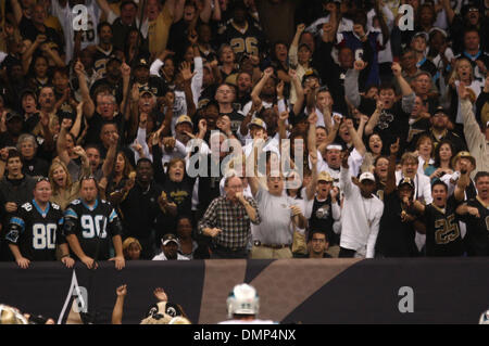 New Orleans Saints fans celebrate as a Carolina Panthers fan gives a thumbs  down sign during an NFL football game, Sunday, Sep. 25, 2022, in Charlotte,  N.C. (AP Photo/Brian Westerholt Stock Photo 