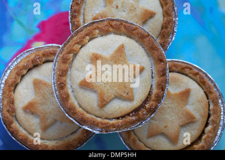 close up of mince pies with stars on, on plate ready for Christmas Stock Photo