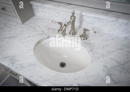 Bathroom Sink With White Marble Counter Stock Photo