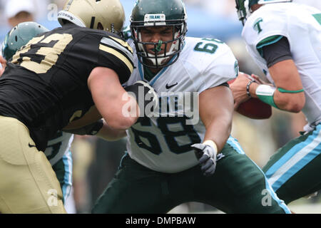 Oct. 03, 2009 - West Point, New York, U.S - 03 October 2009: Tulane center Andrew Nierman #68 defends Tulane quarterback Joe Kemp #7 from Army defensive tackle Michael Gann #93 during game action in the second half of the Tulane at Army football game.  The Black Knights lost to the Green Wave 17-16  at Michie Stadium in West Point New York. (Credit Image: © Alex Cena/Southcreek Glo Stock Photo