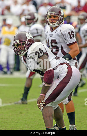 Sep. 27, 2009 - Starkville, Mississippi, U.S - 26 September 2009: Quarteback Tyson Lee (16) and Running Back Anthony Dixon (24) look to the sidelines for the audible play to be changed at the line. The LSU Tigers defeated the MSU Bulldogs 30 - 26 at Davis Wade Stadium in Starkville MS. (Credit Image: © Spruce Derden/Southcreek Global/ZUMApress.com) Stock Photo