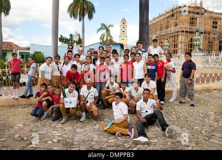 Cuba - a group of secondary schoolchildren on a day trip in the Plaza major central square, Trinidad town, Cuba, Caribbean Stock Photo