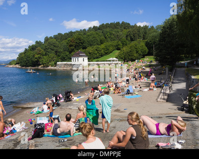 Hvervenbukta beach in the Oslo fjord Norway, close to city center by bus popular with families crowded in summer Stock Photo