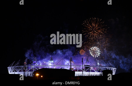 Fireworks explode over Olympic stadium at end of closing ceremony of 2012 London Olympic Game Rio de Janeiro will host 2016 Stock Photo