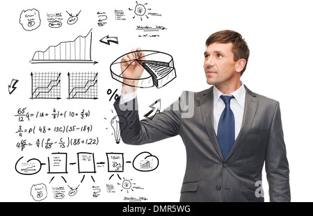 buisnessman drawing plan on virtual screen Stock Photo