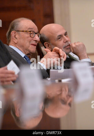 Washington DC, USA. 16th Dec, 2013. U.S. Federal Reserve Chairman Ben Bernanke (R) chats with former Federal Reserve Chairman Alan Greenspan during the U.S. Federal Reserve centennial commemoration at the Federal Reserve building in Washington DC, capital of the United States, Dec. 16, 2013. Credit:  Zhang Jun/Xinhua/Alamy Live News Stock Photo