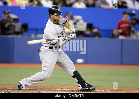 New York Yankees Outfielder Nick Swisher (#33) gets a hit. The Yankees  defeated the Mets 2-1in the game played at Citi fied in Flushing, New York.  (Credit Image: © Anthony Gruppuso/Southcreek Global/ZUMApress.com