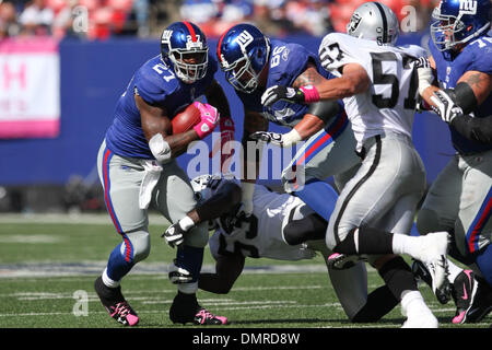 New York Giants running back Brandon Jacobs (27) yells during player  introductions for NFL action between the New York Giants and Detroit Lions  at the New Meadowlands Stadium in East Rutherford, New